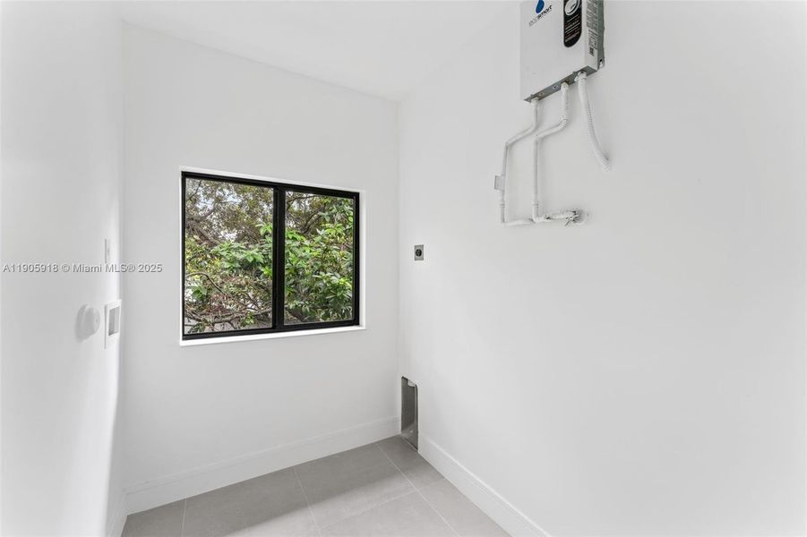 Spacious, unfurnished interior of a new home in , Miami (Image 15). Spacious, unfurnished interior of a new home in , Miami (Image 15).