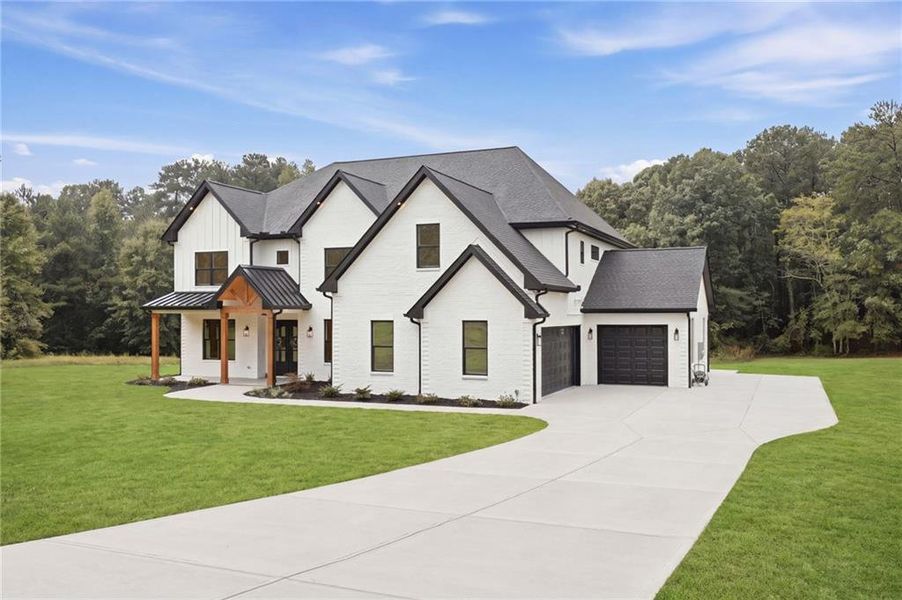 Front exterior of a new home in , Jefferson, GA, highlighting curb appeal (Image 36).