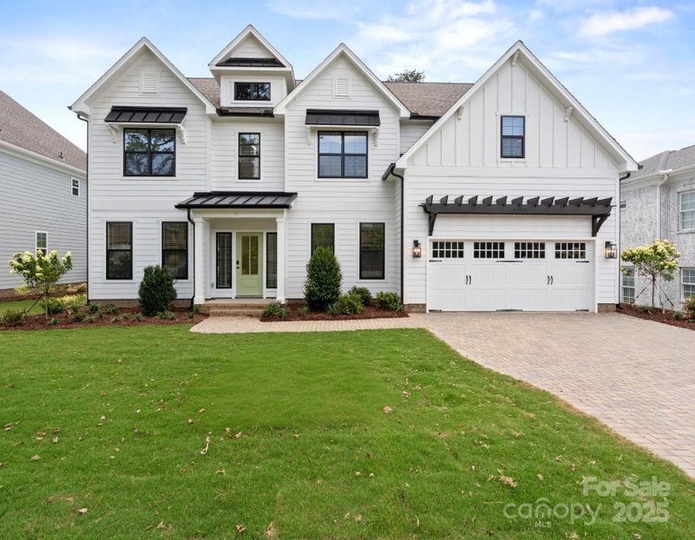 Front exterior of a new home in , Charlotte, NC, highlighting curb appeal (Image 21).