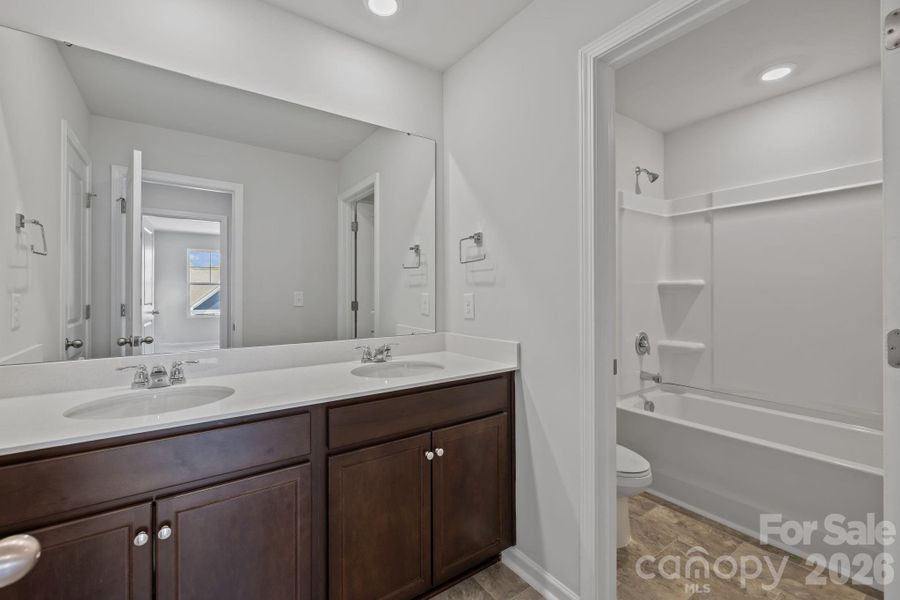 Furnished interior view inside a new home in McFarland Estates, York (Image 10).