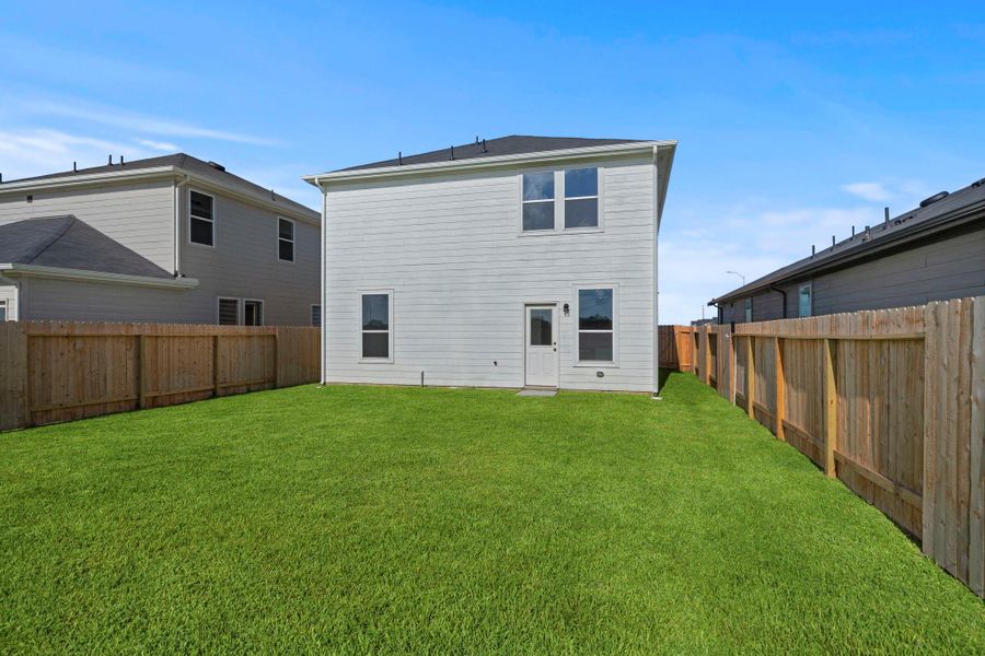 Front exterior of a new home in Stokesbury, Waller, TX, highlighting curb appeal (Image 14).