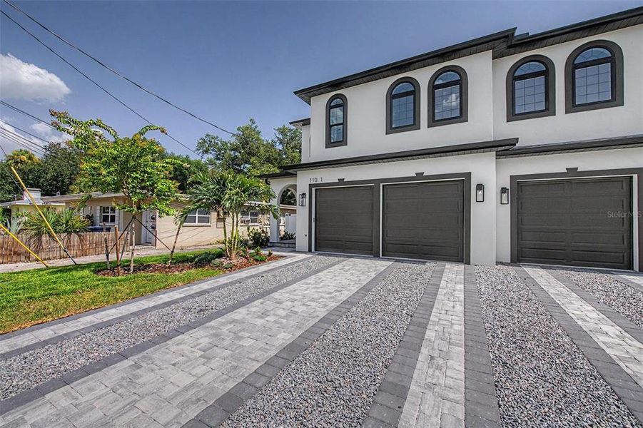 Front exterior of a new home in , Tampa, FL, highlighting curb appeal (Image 2). Front exterior of a new home in , Tampa, FL, highlighting curb appeal (Image 2).