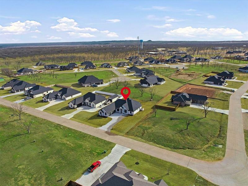 Exterior details and patio area of a home in , Granbury (Image 22).