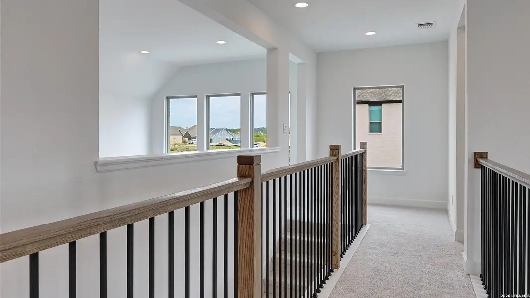 Spacious, unfurnished interior of a new home in Briggs Ranch, San Antonio (Image 25).