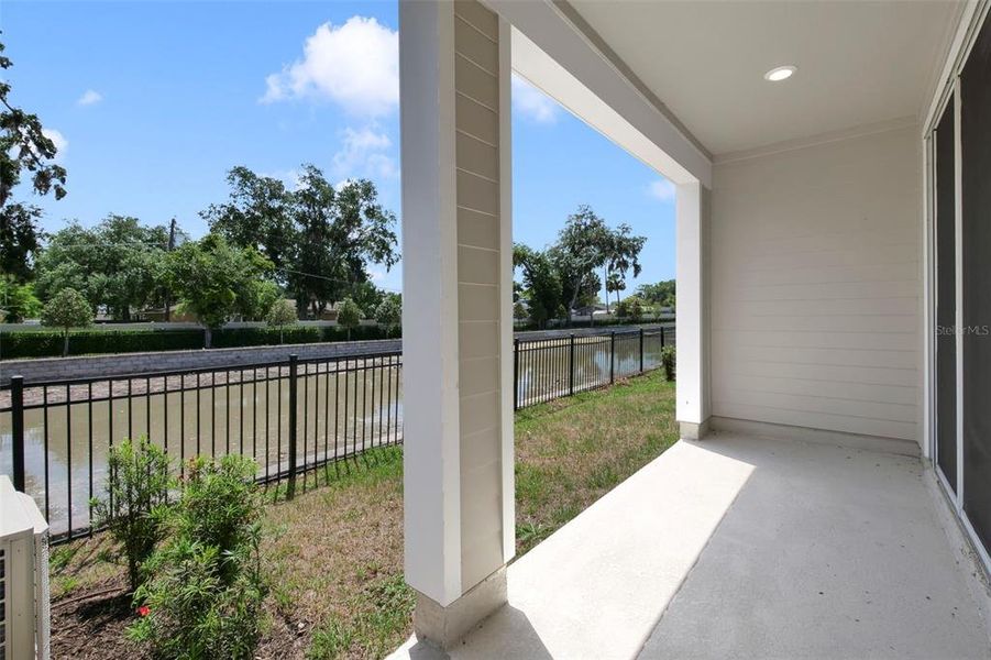 Exterior details and patio area of a home in Towns at Riverwalk, Sanford (Image 17).
