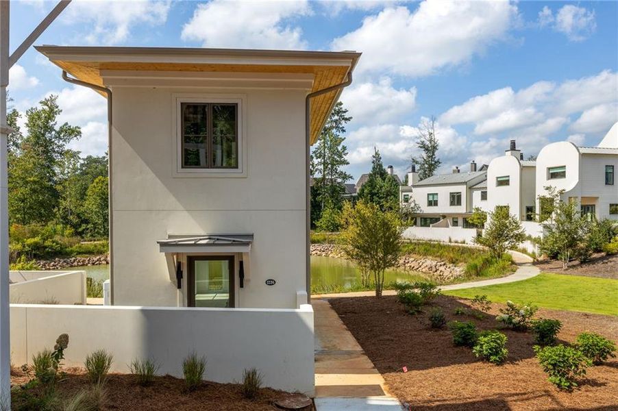 Front exterior of a new home in , Chattahoochee Hills, GA, highlighting curb appeal (Image 14).