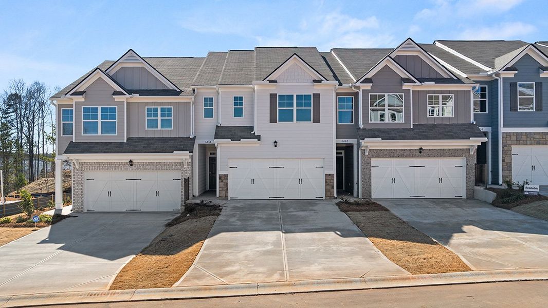 Front exterior of a new home in Hughes Court, Dawsonville, GA, highlighting curb appeal (Image 1).