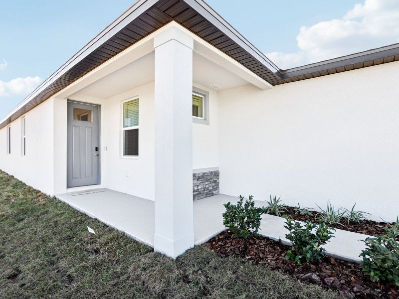 Exterior details and patio area of a home in Benton Hills - Premier Series, Brooksville (Image 3). Exterior details and patio area of a home in Benton Hills - Premier Series, Brooksville (Image 3).