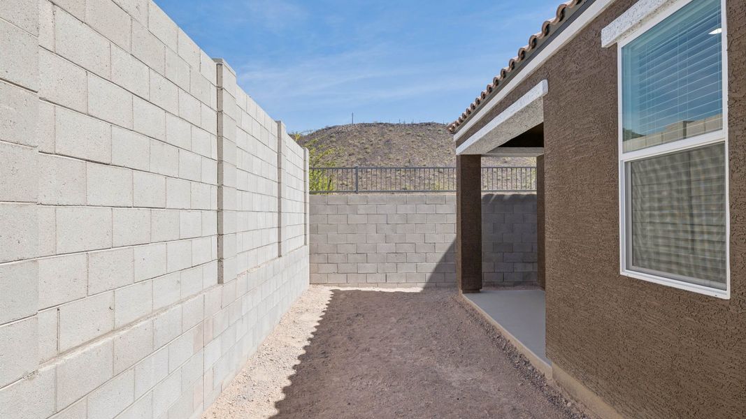 Exterior details and patio area of a home in The Buttes at Mystic, Peoria (Image 27).