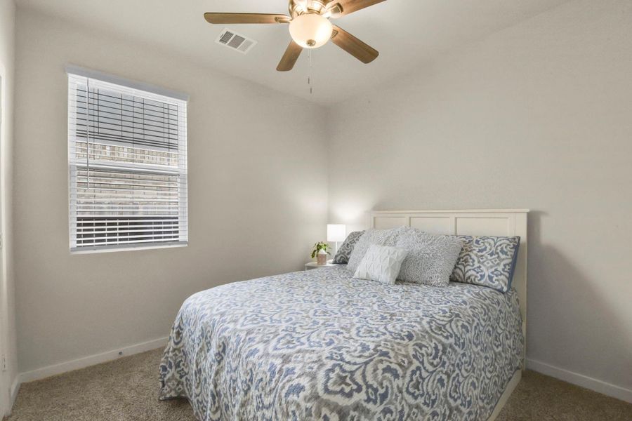 Furnished interior view inside a new home in Harper's Preserve - Traditional Series, Conroe (Image 14).