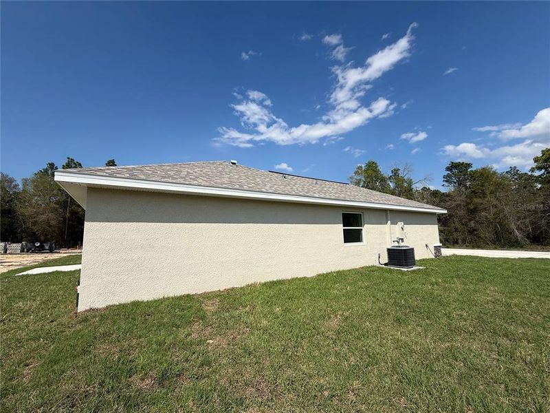 Exterior details and patio area of a home in , Brooksville (Image 19).