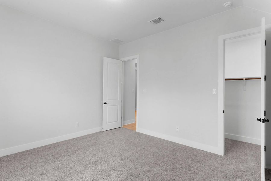 Spacious, unfurnished interior of a new home in The Grove at Blackhawk, Pflugerville (Image 40).