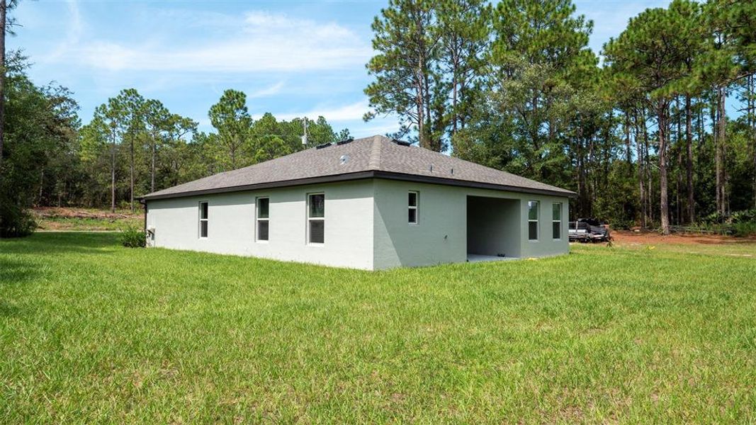 Front exterior of a new home in , Citrus Springs, FL, highlighting curb appeal (Image 2). Front exterior of a new home in , Citrus Springs, FL, highlighting curb appeal (Image 2).