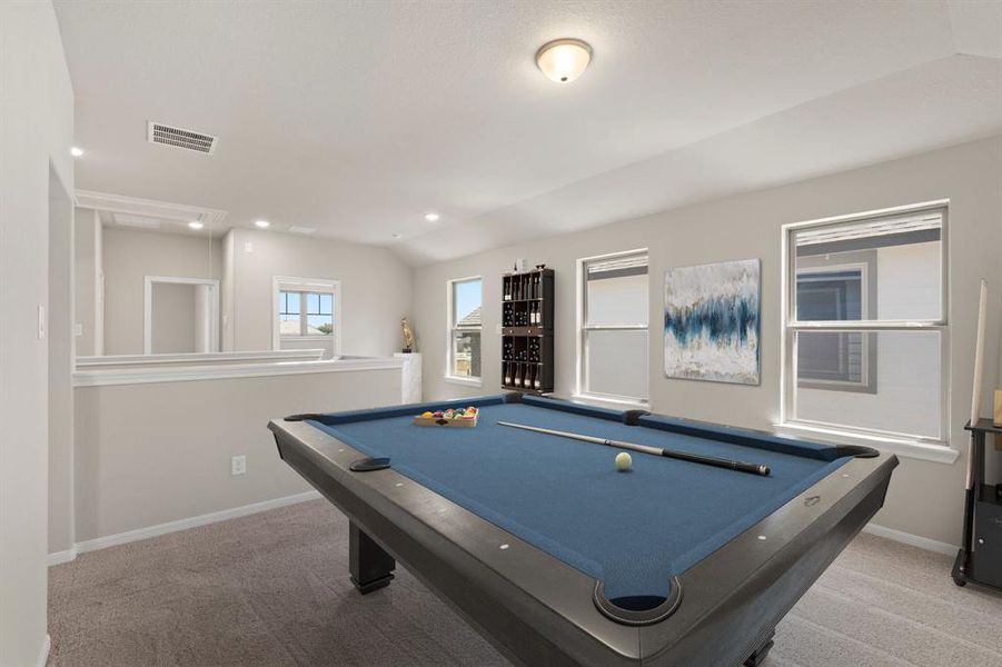 As you make your way upstairs this exceptional game room is a standout feature in this remarkable property, offering a space that combines luxury and fun for all ages.