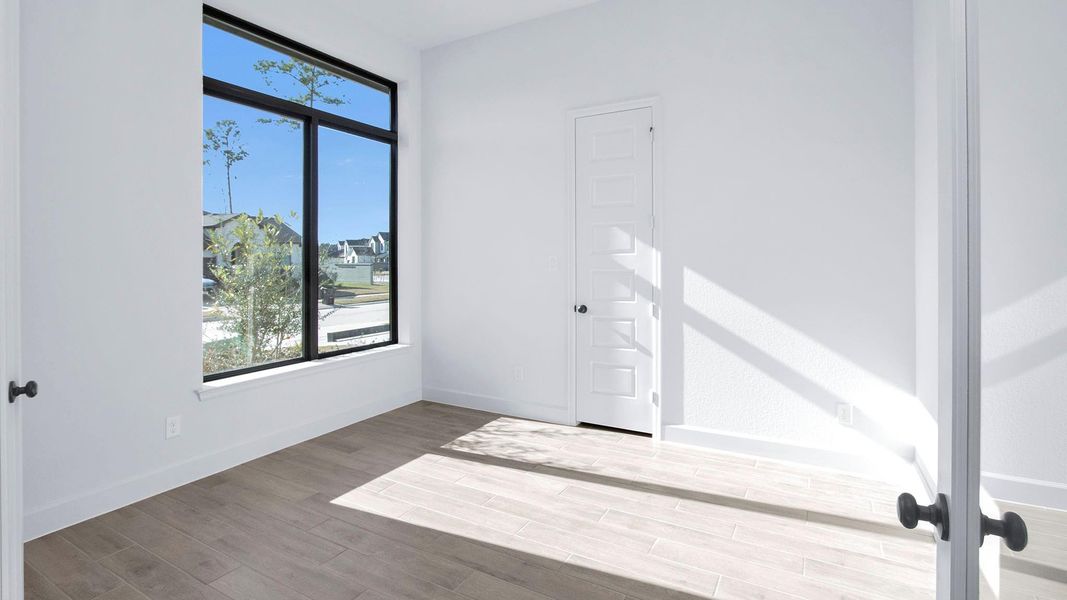 Spacious, unfurnished interior of a new home in Artavia, Conroe (Image 18).