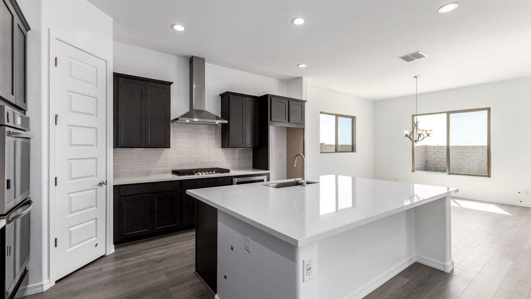 Furnished interior view inside a new home in Windrose, Waddell (Image 10).
