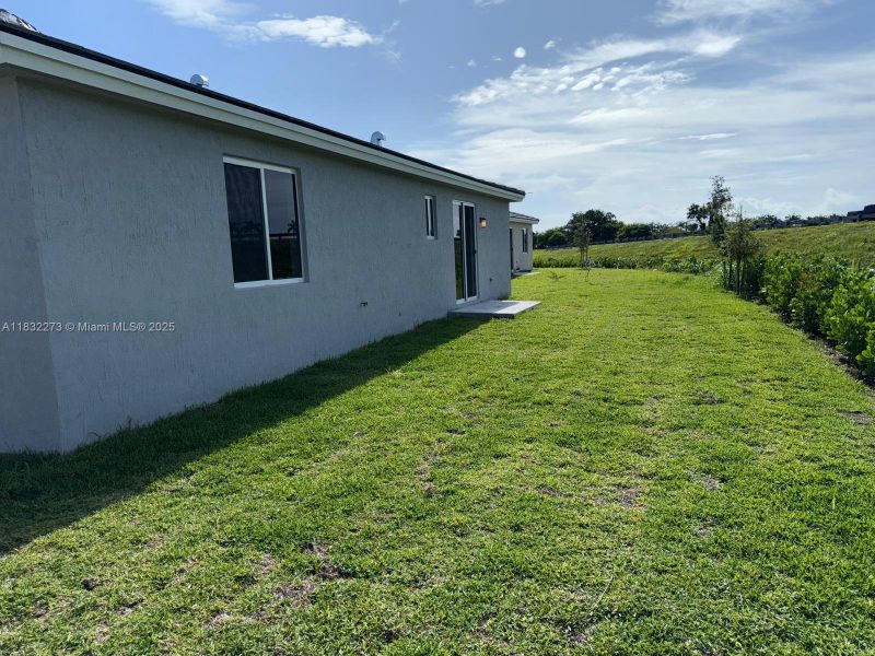 Exterior details and patio area of a home in , Homestead (Image 3). Exterior details and patio area of a home in , Homestead (Image 3).