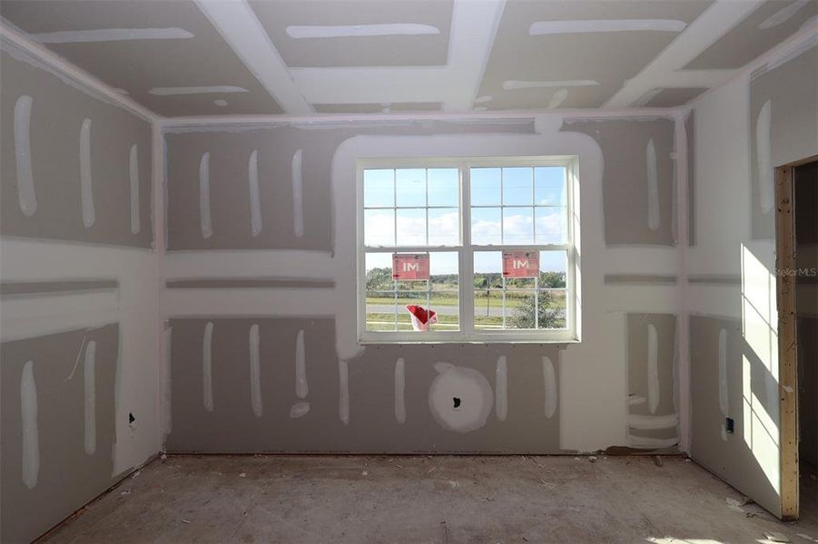 In-progress construction of a new home in Lake Star at Ovation, Winter Garden, FL (Image 18).