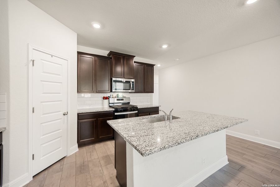 Furnished interior view inside a new home in Riverstone at Westpointe, San Antonio (Image 34).