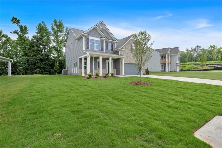 Front exterior of a new home in , Adairsville, GA, highlighting curb appeal (Image 22).