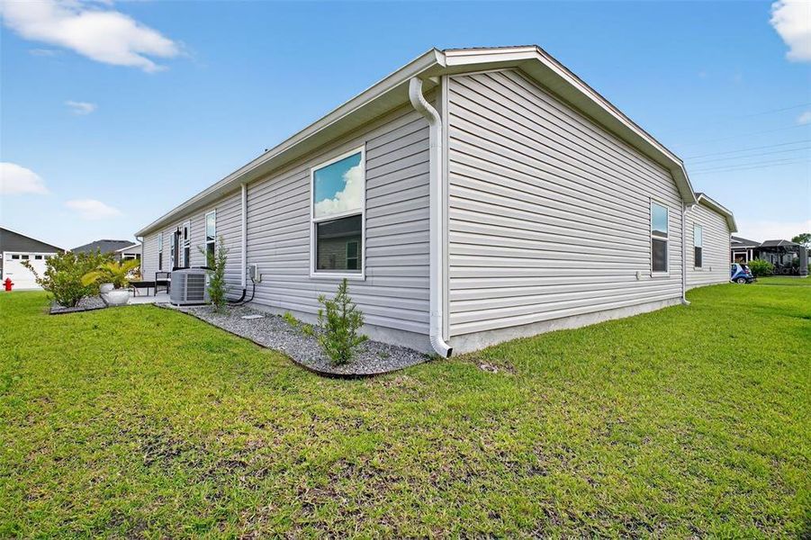 Front exterior of a new home in , The Villages, FL, highlighting curb appeal (Image 1). Front exterior of a new home in , The Villages, FL, highlighting curb appeal (Image 1).
