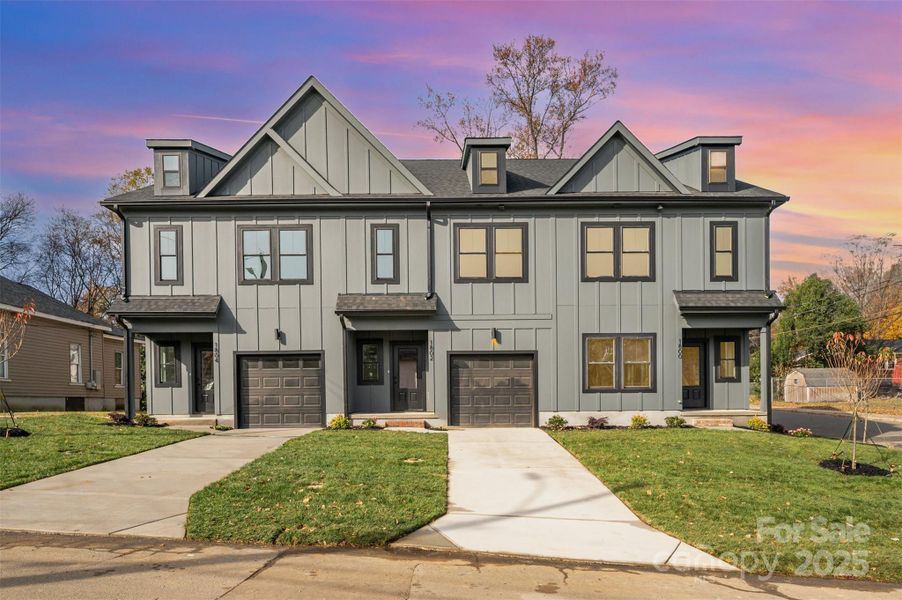 Front exterior of a new home in , Charlotte, NC, highlighting curb appeal (Image 1).