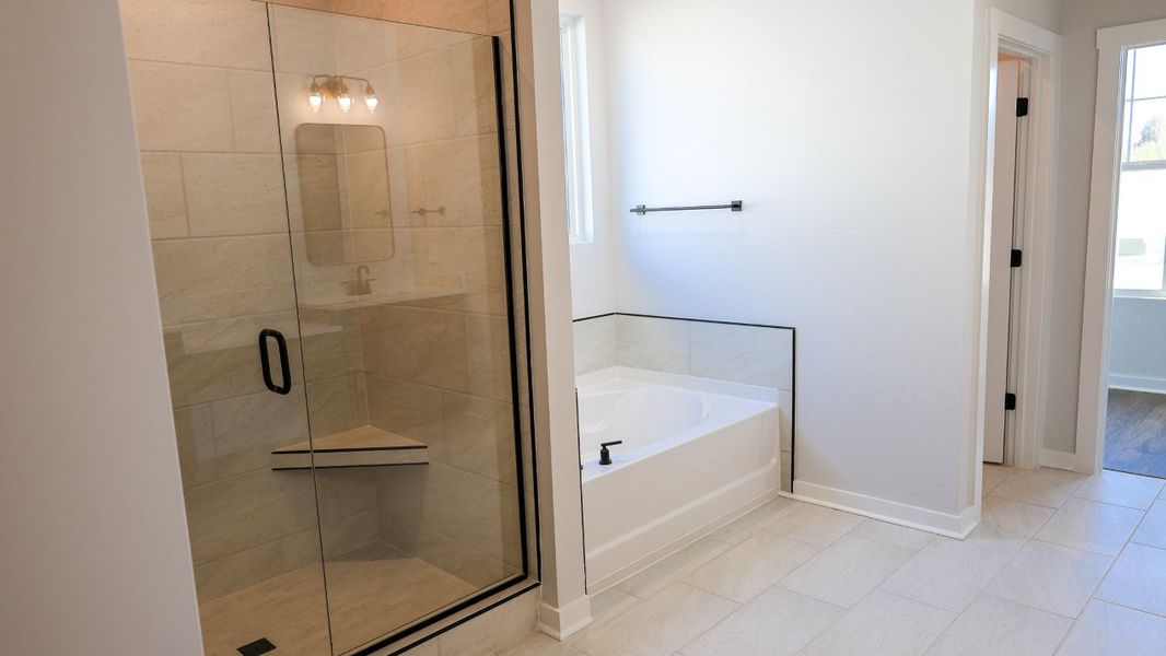 Representative furnished interior of a home built from the TISDALE by D.R. Horton in Harvest Point, Spring Hill (Image 5).