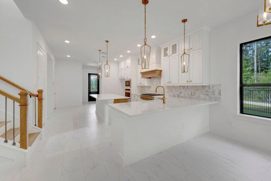 Furnished interior view inside a new home in The Highlands - Grove Collection, Porter (Image 16).