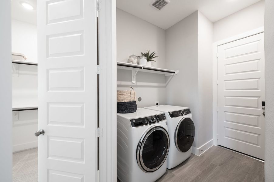 Representative furnished interior of a home built from the Verdin by Tri Pointe Homes in Pecan Ridge, Fulshear (Image 56).