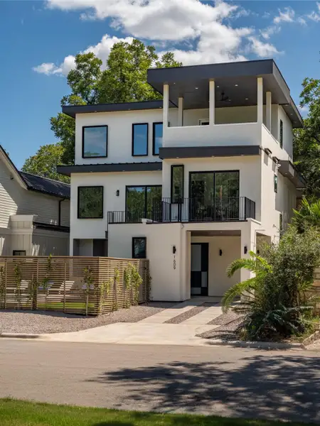 Clean lines and multi-level balconies define this striking modern home exterior. Clean lines and multi-level balconies define this striking modern home exterior.