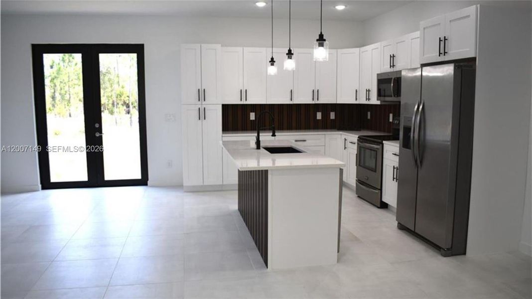 Furnished interior view inside a new home in , Lehigh Acres (Image 3). Furnished interior view inside a new home in , Lehigh Acres (Image 3).