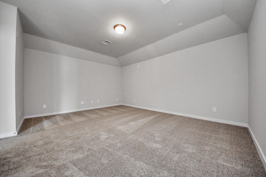 Take another look at the spacious media room, perfect for movie nights. Sample photo of completed home with similar floor plan. Actual colors and selections may vary. Take another look at the spacious media room, perfect for movie nights. Sample photo of completed home with similar floor plan. Actual colors and selections may vary.