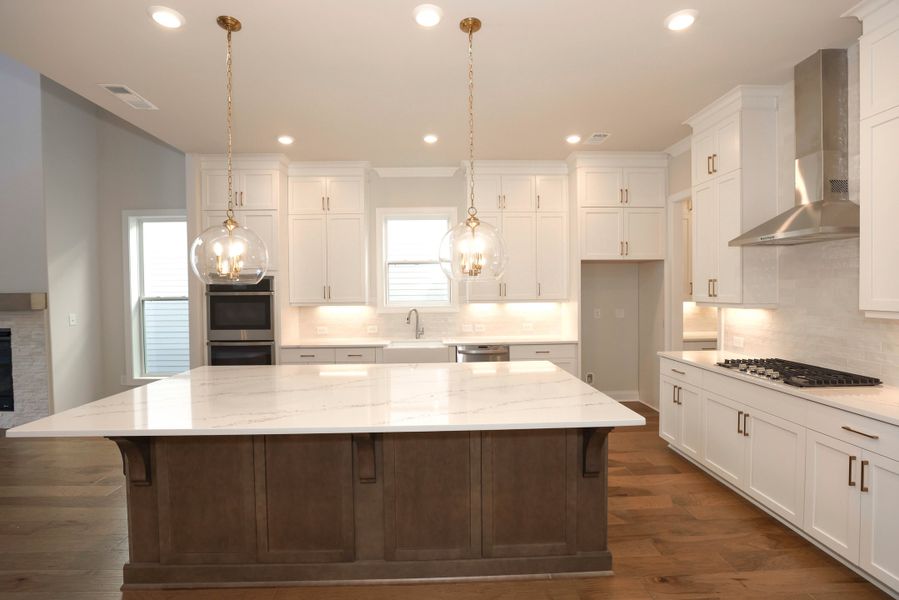 Representative furnished interior of a home built from the The Maddox by The Providence Group in Bellmoore Park, Johns Creek (Image 8).