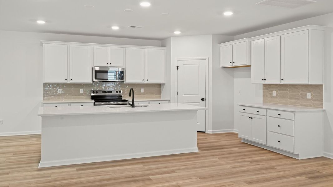 Furnished interior view inside a new home in Creekside at Andrews, Summerville (Image 6). Furnished interior view inside a new home in Creekside at Andrews, Summerville (Image 6).