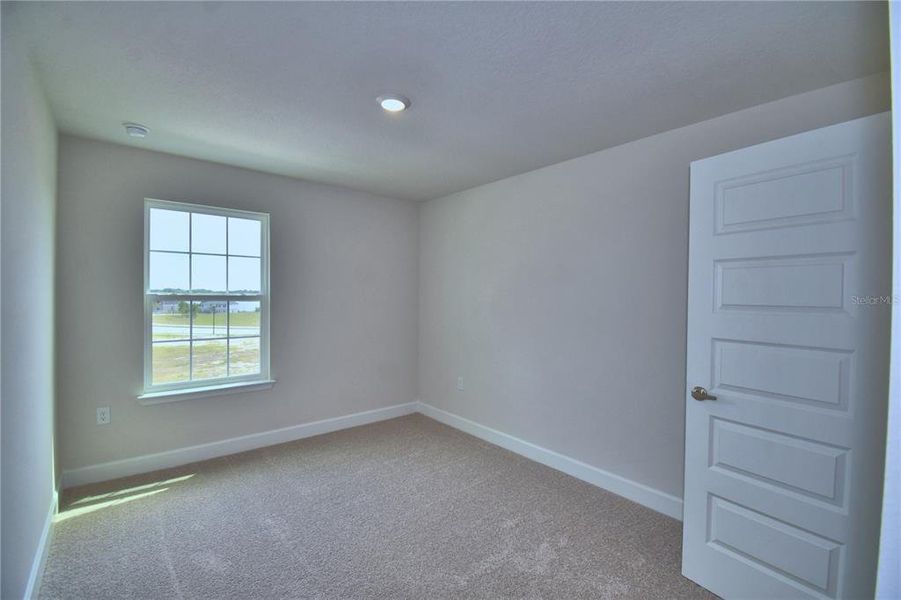 Spacious, unfurnished interior of a new home in Lake Juliana Estates, Auburndale (Image 24).