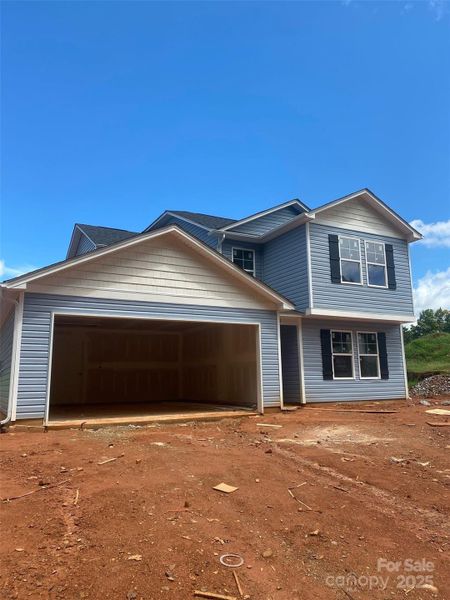 Front exterior of a new home in , Shelby, NC, highlighting curb appeal (Image 1).