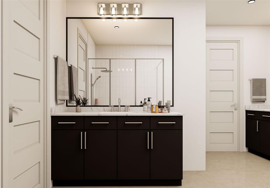 The thoughtfully designed primary bathroom in the ROCcreek offers a refined escape featuring sophisticated details, generous space, and a seamless blend of comfort and functionality for elevated daily living. Image shown is an artist’s rendering; final colors and selections may vary. Please see the New Home Consultant for details.