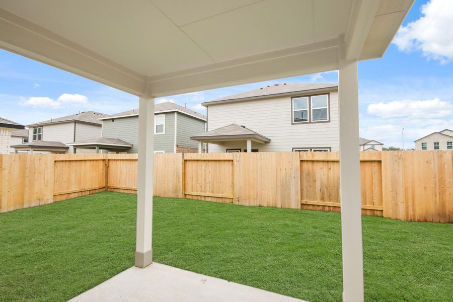 Exterior details and patio area of a home in Lakes at Black Oak, Magnolia (Image 3).