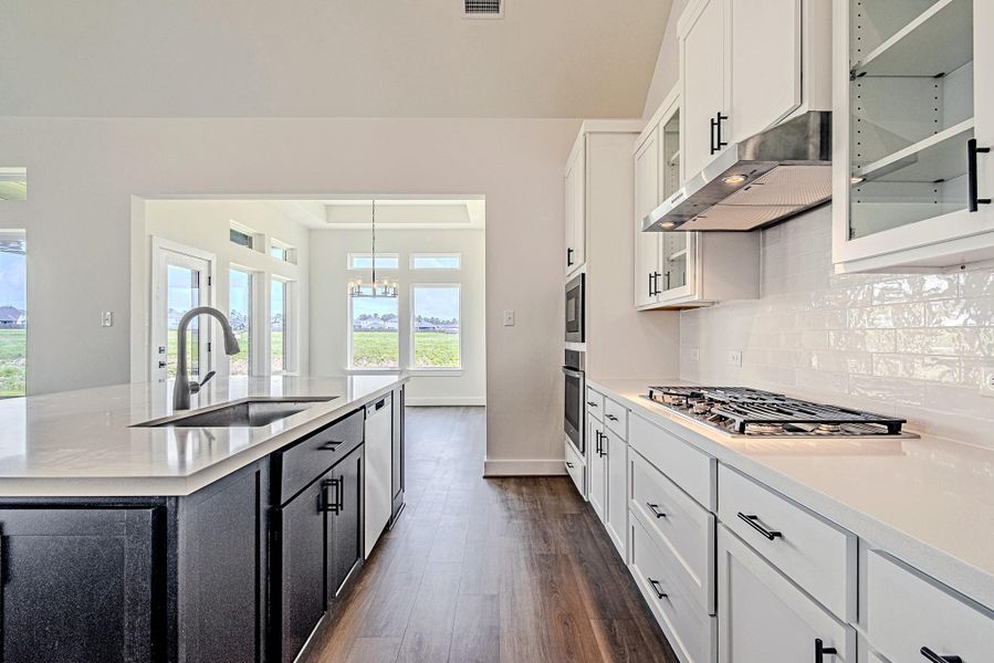 Thoughtfully designed with ample cabinetry, generous counter space, and a functional layout to keep everything within easy reach Thoughtfully designed with ample cabinetry, generous counter space, and a functional layout to keep everything within easy reach