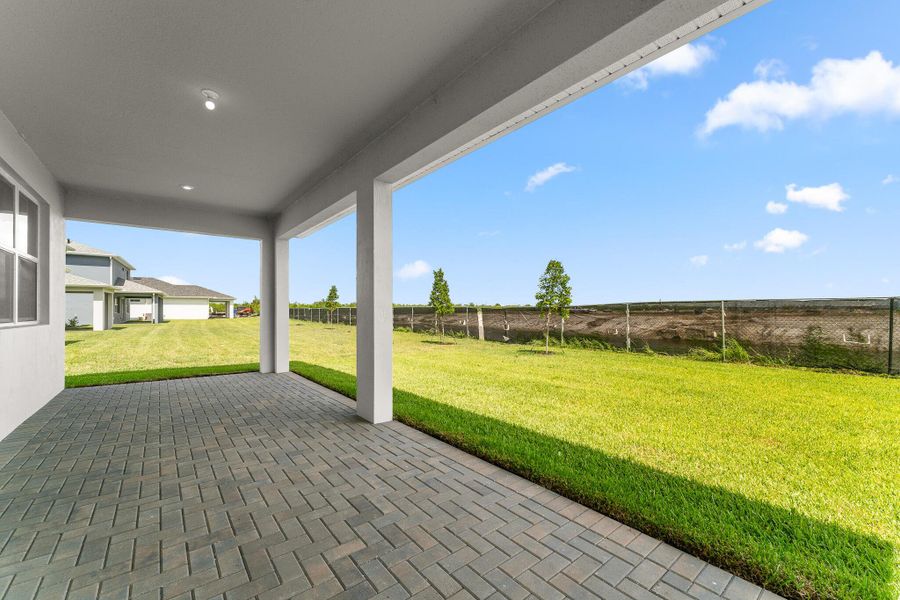 Exterior details and patio area of a home in Tradition - Cadence, Port St. Lucie (Image 2).