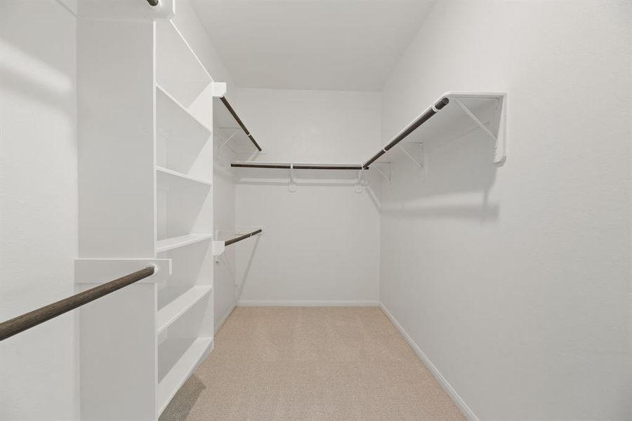 Walk-in closet in owner's suite (*Photo not of actual home and used for illustration purposes only.)