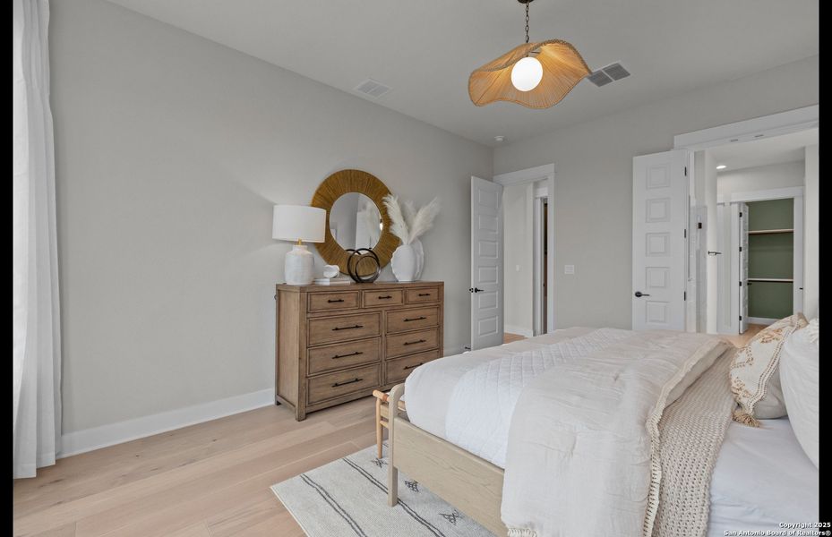 Furnished interior view inside a new home in Bison Ridge, San Antonio (Image 28).