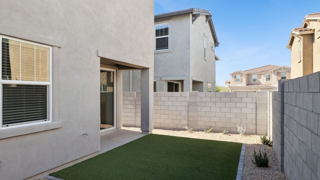 Exterior details and patio area of a home in Talinn Towns at Desert Ridge, Phoenix (Image 4).