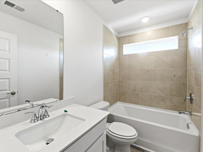 Furnished interior view inside a new home in The Coves at Lakes of Cane Bay II, Summerville (Image 16).