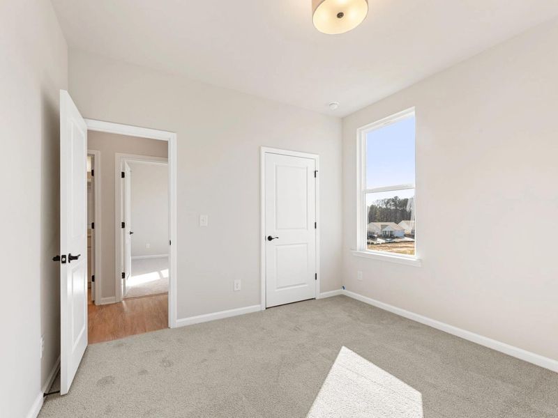 Spacious, unfurnished interior of a new home in Kelly Preserve, Loganville (Image 17).