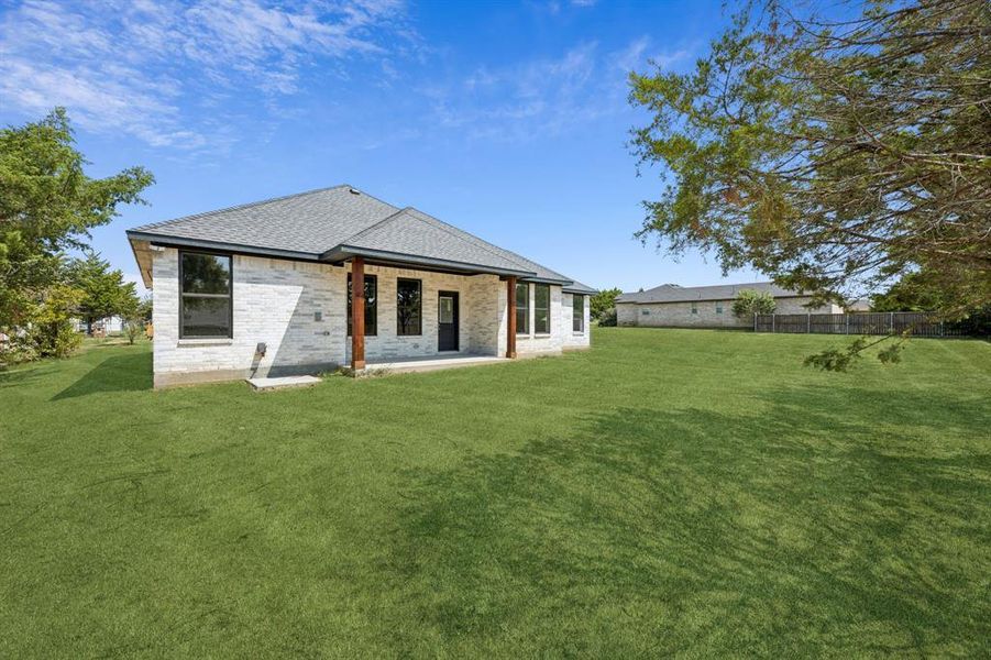 Exterior details and patio area of a home in , Glenn Heights (Image 28).