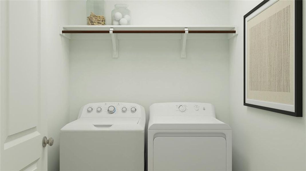 Laundry area with laundry area and washing machine and clothes dryer