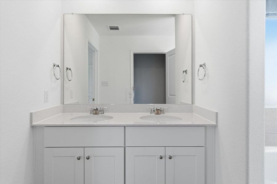 Furnished interior view inside a new home in Thunder Rock: Watermill Collection, Marble Falls (Image 15).