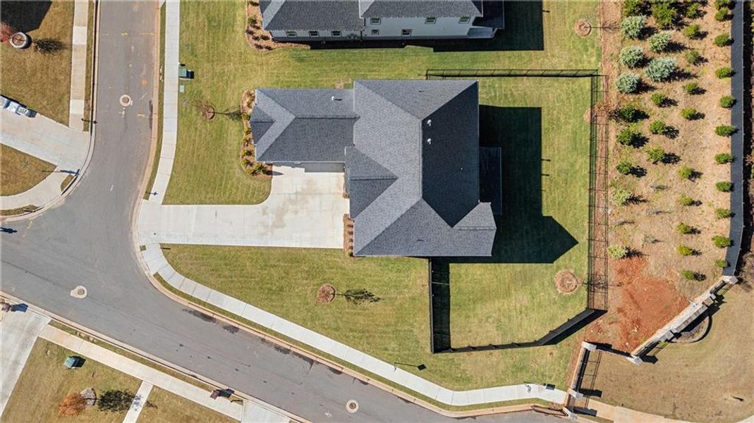Exterior details and patio area of a home in The Retreat at Caney Creek, Alpharetta (Image 34).