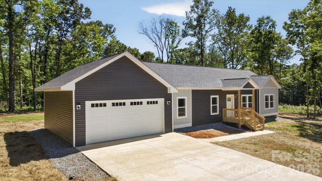 Front exterior of a new home in , Columbus, NC, highlighting curb appeal (Image 20).
